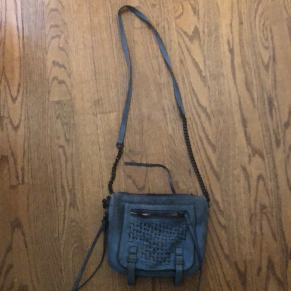 She Lo crossbody denim color.  Sueded fabric